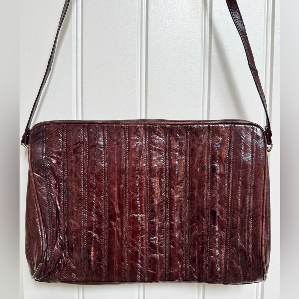 Vintage Brown Eel Skin Shoulder Purse. 10” by 7.5” by 0.5” with strap drop 15”.